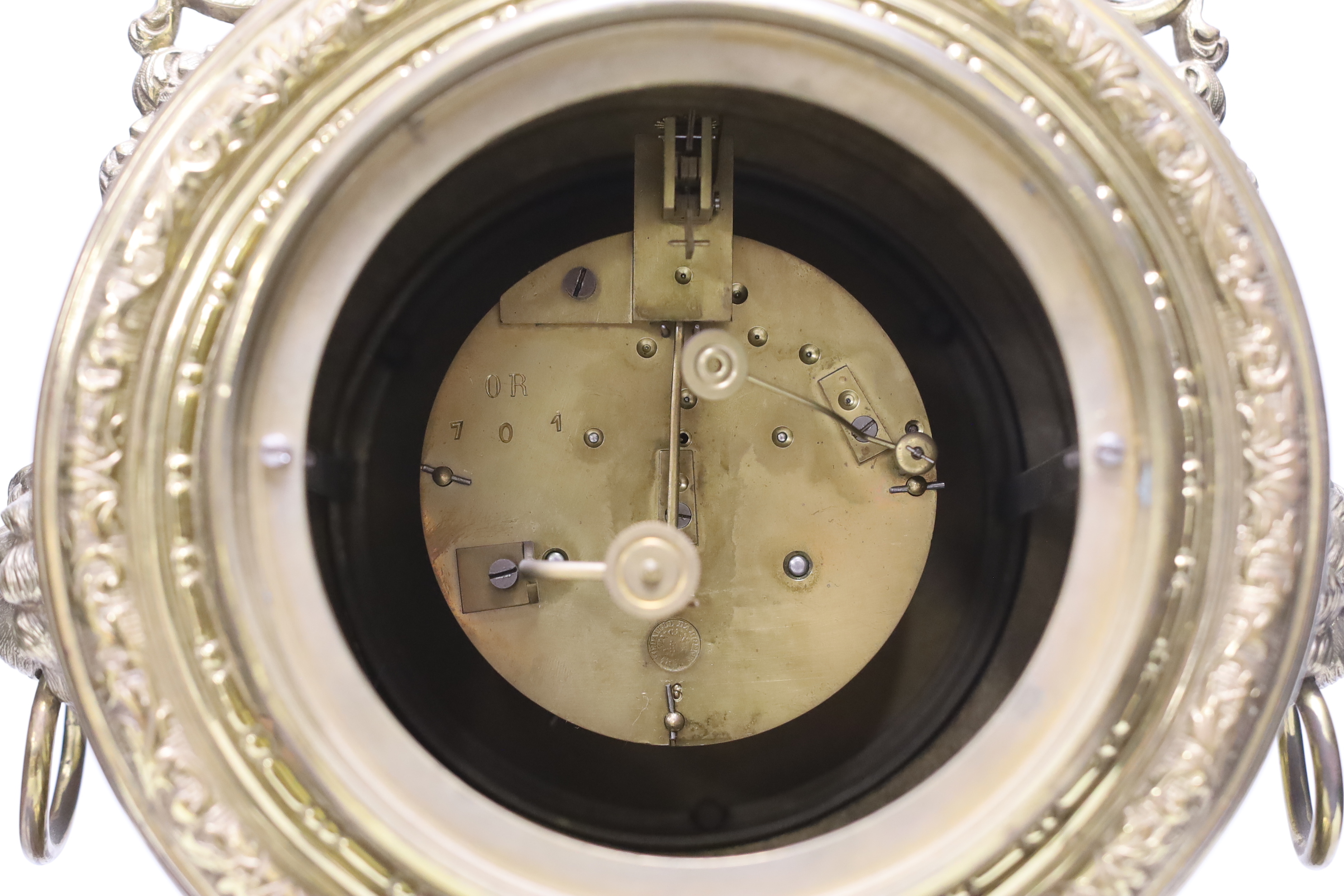 A late 19th century French Louis XIV revival brass drum shape clock, 46cm tall